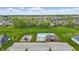 Overhead shot of a neighborhood pool, playground, and green area, ideal for community gatherings and activities at 3650 Merchmont Rd, Bargersville, IN 46106
