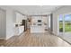 Bright kitchen with white cabinetry, a center island, and stainless steel appliances at 3650 Merchmont Rd, Bargersville, IN 46106