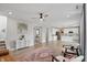 Spacious living area featuring neutral tones, an open layout, and a view to the kitchen at 3650 Merchmont Rd, Bargersville, IN 46106