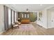 Bright living room featuring a comfortable seating area, staircase, and modern decor at 3650 Merchmont Rd, Bargersville, IN 46106