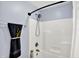 Bright bathroom with neutral walls, a shower and a towel at 405 N Church St, Mooresville, IN 46158