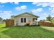 Well maintained one-story home with green grass and a charming yellow exterior at 405 N Church St, Mooresville, IN 46158