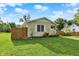 Charming home with fresh exterior and fenced yard with healthy lawn at 405 N Church St, Mooresville, IN 46158