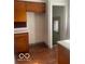 Traditional-style kitchen features wood cabinets and updated laminate countertops at 416 W 21St St, Anderson, IN 46016