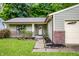 Charming single-story home with a well-manicured lawn and landscaped yard at 4309 Clayburn Dr, Indianapolis, IN 46268