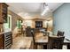 Open-concept living area featuring a cozy fireplace, comfortable seating, and seamless connection to the kitchen at 4309 Clayburn Dr, Indianapolis, IN 46268