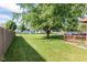Spacious backyard with mature tree, shed, and fenced perimeter at 444 Austin Dr, Avon, IN 46123