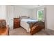 Relaxing bedroom with plush carpeting, a bed, and natural light coming through the window at 444 Austin Dr, Avon, IN 46123