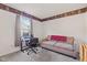 Bedroom with a study area, neutral carpeting, and natural light coming through the window at 444 Austin Dr, Avon, IN 46123