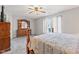 Comfortable main bedroom offering neutral colors, plush carpet, fan, and natural light at 444 Austin Dr, Avon, IN 46123