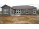 New construction home featuring a gray exterior and a spacious backyard at 4999 Hummingbird Dr, Brownsburg, IN 46112