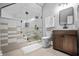 Modern bathroom featuring a glass shower, stylish vanity, and contemporary fixtures at 545 Fletcher Ave, Indianapolis, IN 46203