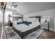 Inviting bedroom with a queen-sized bed, bunk bed, and soft natural light at 545 Fletcher Ave, Indianapolis, IN 46203