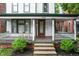 Welcoming front porch with seating and classic architectural details at 545 Fletcher Ave, Indianapolis, IN 46203