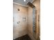 Shower featuring stonework and a modern shower head and fixtures at 545 Fletcher Ave, Indianapolis, IN 46203