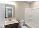 Bathroom featuring a single vanity and a shower-tub combination with white walls at 6038 Windsor Dr, McCordsville, IN 46055