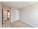 Bedroom with neutral-colored carpet, an interior door, and a window at 6038 Windsor Dr, McCordsville, IN 46055