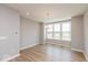 Bright dining area with wood flooring, recessed lighting, and large windows offering outdoor views at 6038 Windsor Dr, McCordsville, IN 46055