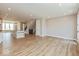Open floor plan showcasing kitchen and staircase with wood flooring and recessed lighting at 6038 Windsor Dr, McCordsville, IN 46055