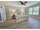 Bright bedroom features fresh paint, new vinyl floors, and plenty of natural light at 6369 Kelsey Dr, Indianapolis, IN 46268