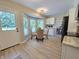 Cozy breakfast nook featuring bay windows, a dining table, and views of the backyard at 6369 Kelsey Dr, Indianapolis, IN 46268