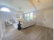 Bright living room with vaulted ceilings, modern furnishings, and ample natural light at 6369 Kelsey Dr, Indianapolis, IN 46268