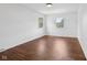 Bright bedroom with hardwood floors and ample natural light at 6838 Johnson Rd, Indianapolis, IN 46220