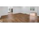 Bright living room featuring hardwood floors at 6838 Johnson Rd, Indianapolis, IN 46220