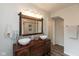 Charming bathroom featuring a wooden vanity with double vessel sinks and a subway tile shower at 702 S Keystone Ave, Indianapolis, IN 46203