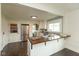 Bright kitchen with modern appliances and a breakfast bar overlooking the dining area at 702 S Keystone Ave, Indianapolis, IN 46203