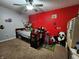 bedroom with fun, colorful decor, carpeted flooring and a ceiling fan at 7511 Eddie Ln, Camby, IN 46113