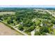 Aerial view of property lines amid lush greenery, highlighting the spacious layout and potential at 7516 S County Road 300 W, Clayton, IN 46118