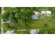 Overhead view of the property, outlining its spacious layout with trees and outbuilding at 7516 S County Road 300 W, Clayton, IN 46118