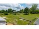 The backyard features lush greenery and ample space for recreation or gardening projects at 7516 S County Road 300 W, Clayton, IN 46118