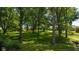Expansive backyard with mature trees and a tranquil setting, perfect for outdoor activities at 7516 S County Road 300 W, Clayton, IN 46118