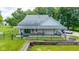 Backyard patio with ample seating, ideal for relaxing and entertaining guests outdoors at 7516 S County Road 300 W, Clayton, IN 46118