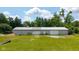 Large detached garage with multiple bays, offering plenty of room for vehicles and storage at 7516 S County Road 300 W, Clayton, IN 46118