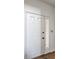 Bright white front door with glass accents, leading to a welcoming interior at 7685 River Rd, Indianapolis, IN 46240