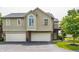 Charming two-story condo with two car garage and private balcony at 7685 River Rd, Indianapolis, IN 46240