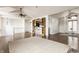 Inviting open-concept living room with a breakfast bar and hardwood floors at 7685 River Rd, Indianapolis, IN 46240