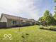 Large backyard features a deck, playset, and patio area at 774 Courtney Cir, Danville, IN 46122