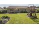 Backyard with patio area and playset at 774 Courtney Cir, Danville, IN 46122