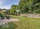 Spacious backyard with a playset and patio area at 774 Courtney Cir, Danville, IN 46122