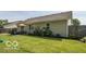 Spacious backyard featuring a well-maintained lawn, privacy fence, and outdoor seating area perfect for entertaining at 774 Courtney Cir, Danville, IN 46122