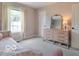 Cozy bedroom with plush carpet, a comfortable daybed, and lots of natural light at 774 Courtney Cir, Danville, IN 46122