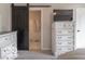 Bedroom featuring a TV, dresser, and ensuite bathroom at 774 Courtney Cir, Danville, IN 46122