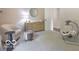 This bedroom has a fluffy stool, dresser, chair, and baby swing at 774 Courtney Cir, Danville, IN 46122