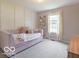 Cozy bedroom with paneling, a comfortable daybed, and lots of natural light at 774 Courtney Cir, Danville, IN 46122