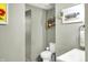 Bathroom features a toilet, white sink, and neutral paint at 8019 E Hanna Ave, Indianapolis, IN 46239