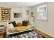 Bright bedroom with stylish daybed, black and white rug, and natural light at 8019 E Hanna Ave, Indianapolis, IN 46239